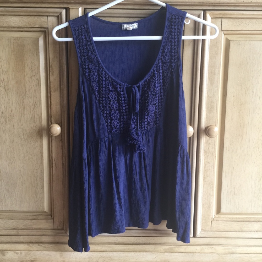Eyeshadow. Navy blue tank top.